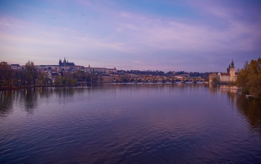 Prague castle and Charles bridge at dusk