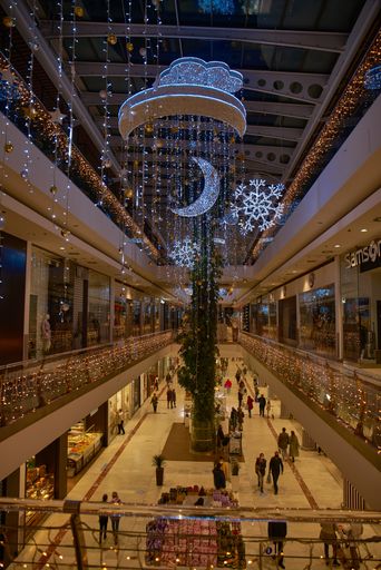 Prague, Czech Republic - November 17, 2020: Empty Christmas decorated shopping mall during covid-19 lockdown