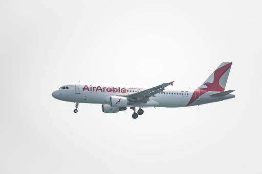 Barcelona, ​​Spain; March 25, 2021: Airbus A320 of Air Arabia in the air with white background
