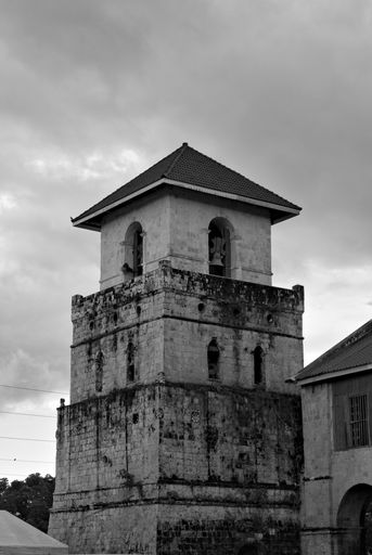 A grayscale shot of the bell tower of Baclayon Church. Bohol, Philippines.