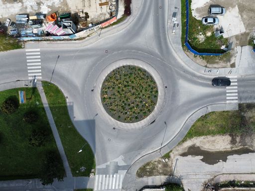 An aerial shot of a roundabout intersection in Bratislava, Slovakia.