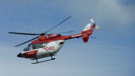 Rescue helicopter approaching the landing platform at the hospital