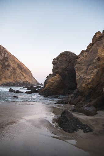 A stunning view of the Pfeiffer sandy beach in Big Sur with giant rock formations in California
