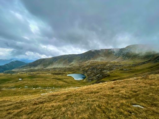 Capra Lake is a stunning glacial lake located on the picturesque southern slope of the Fagaras mountain range