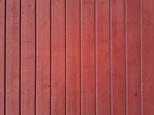 A closeup of red wooden planks texture background