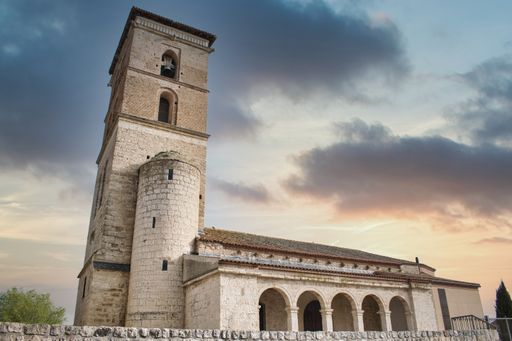 A beautiful shot of the San Cipriano Church under a cloudy sky in Funsaldana, Spain