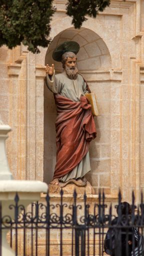 A statue of Saint Paul at the entrance of the iconic Sanctuary of Our Lady in Mellieha, Malta