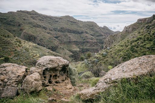 A view of a winding dirt path snaking its way through a rural landscape, La Gomera, Canary Islands
