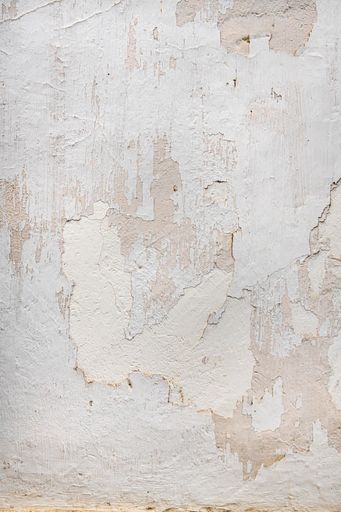 Full frame weathered white plaster wall