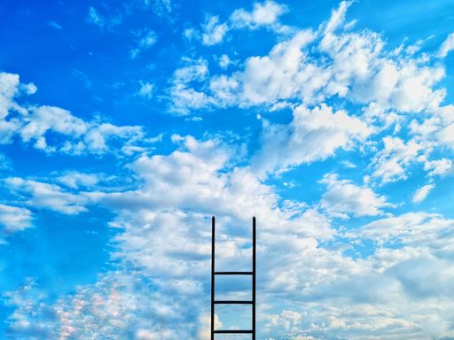 A conceptual photo of a ladder to climb into the sky