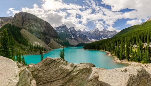 A beautiful view of the Moraine lake with snow-covered rocky mountains in Banff National Park, Canada