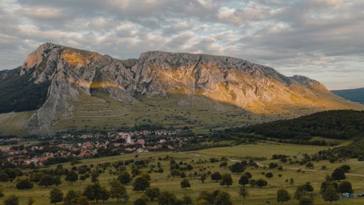 Scenic Piatra Secuiului cliffs - a small limestone range in Trascaului Mountains seen from Rimetea Village in Romania