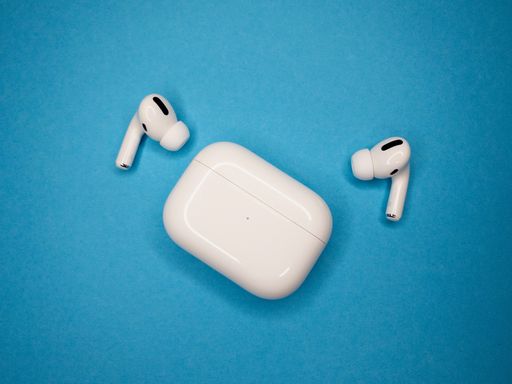 Apple AirPods Pro in Case on colorful background.