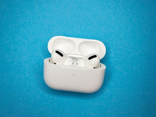 Apple AirPods Pro in Case on colorful background.