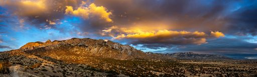 A majestic view of the Sandia Mountains in Albuquerque, New Mexico during sunset