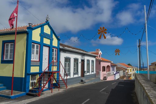 A street in Angra do Heroismo with a blue and yellow typical shrine in Imperio, Terceira, Azores, Portugal