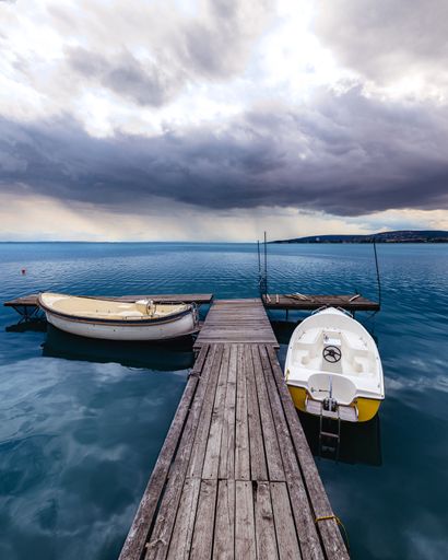 Stunning blue water with boats. Balatonfuzfo, Hungary. Lake Balaton