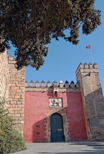 A vertical shot of the Royal Alcazar of Seville in Spain