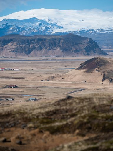 An aerial view of the vast desert and majestic mountain ranges