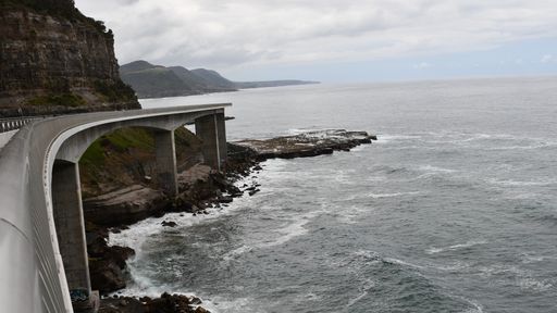 A beautiful shot of the Sea Cliff Bridge in Australia on background of the cloudy sky