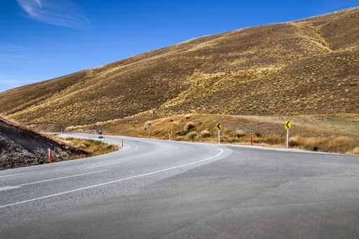 A sharp bend on the Crown Range Road Between Queenstown and Wanaka in New Zealand