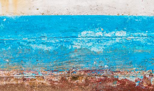 A closeup shot of painted rustic wooden planks