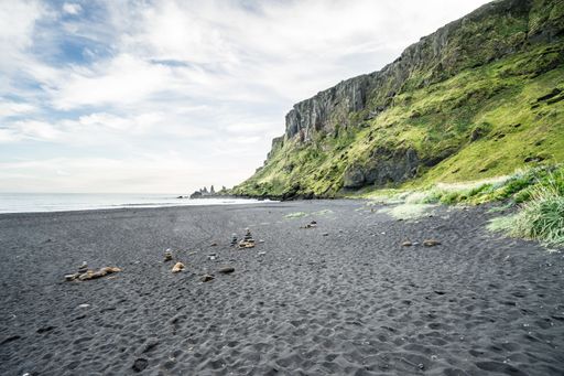A mesmerizing view of a Reynisfjara Beach in Vik, Iceland