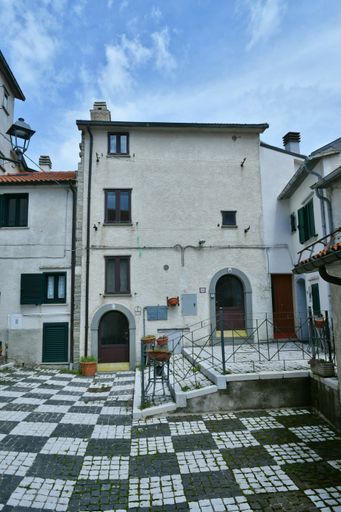 A street among the characteristic stone houses in a small village in central Italy.