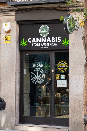 Madrid Spain. April 6, 2021. Vertical shot of the entrance door to the Cannabis store Amsterdam Madrid located on Toledo street in Madrid city