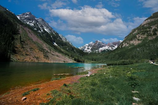 Beautiful shot of the river with mountains on the background, Maroon Snowmass Trailhead, USA