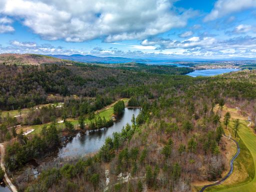An aerial shot over a Golf Course in the Mountains of New Hampshire.