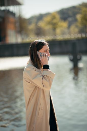A portrait of a young french businesswoman with her smartphone in Lyon, France
