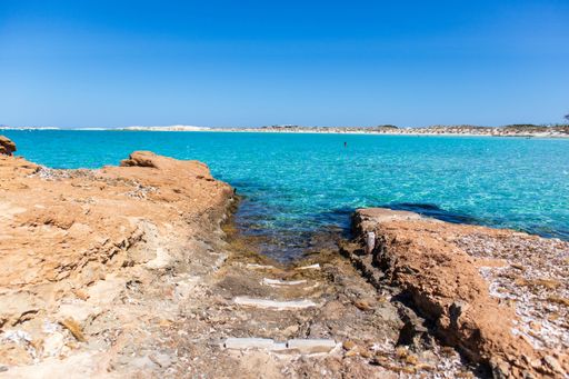 A mesmerizing view of a beautiful seascape against a blue sky