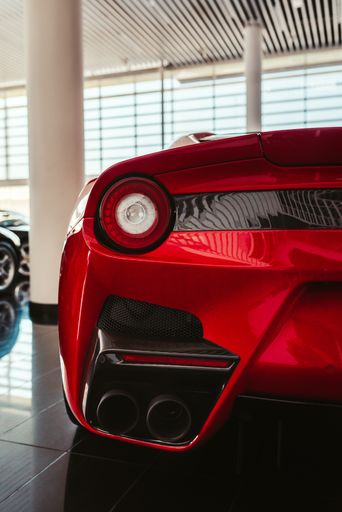 Luxury red sport car in Showroom  in Dubai
