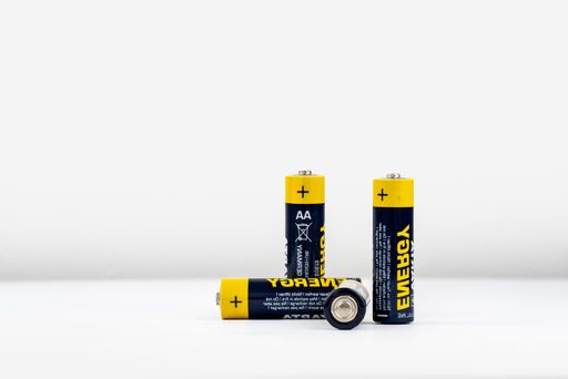 A set of pen batteries isolated against a white background, lying flat and standing up