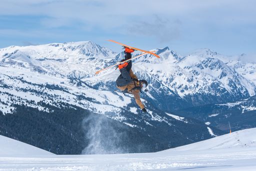 A closeup shot of a young male skiing in the Pyrenees at the Grandvalira ski resort in Andorra i