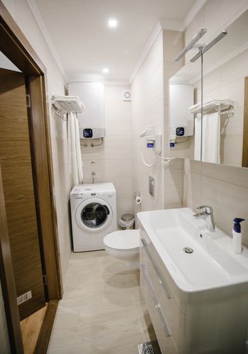 A vertical shot of a bathroom interior