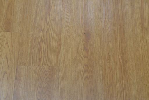 A top view shot of an old wooden parquet under the light