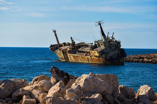 A scenic view of an abandoned ship near the coast of Cyprus