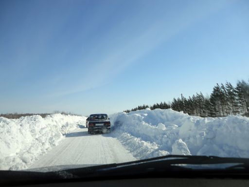A winter road in Siberia from the car window