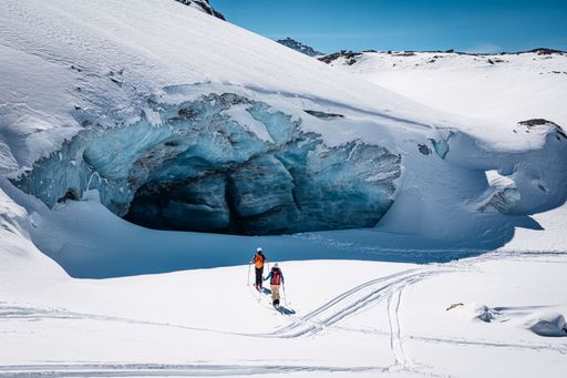 A breathtaking winter scene featuring adventurers in Italy's Val Senales, South Tyrol