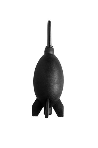 Vertical shot of black rocket-shaped air blower for cleaning camera sensor and lenses isolated on white background.