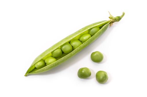 Fresh green pea open pod with seeds isolated on white background