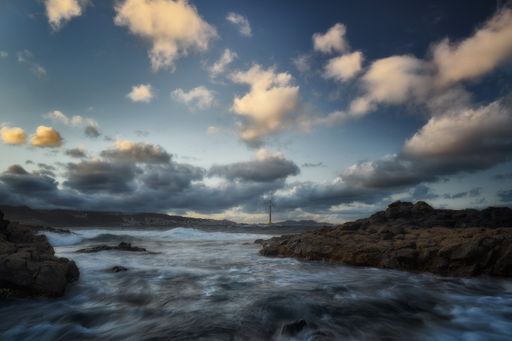A scenic shot of Gran Canaria under a beautiful cloudscape during sunset in Canary Islands, Spain