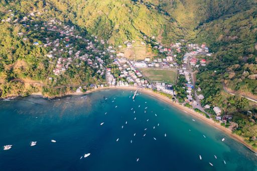 An aerial view of Charlotteville village with fishing boats and yachts, Trinidad and Tobago