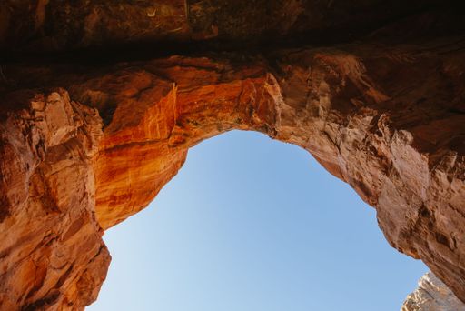 A mesmerizing view of the iconic red rock formations of Sedona, Arizona against a bright blue sky