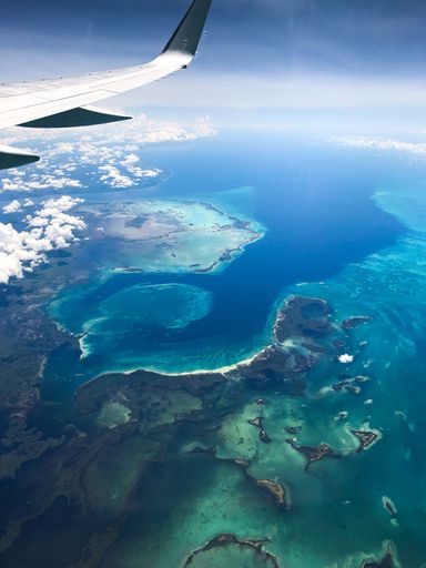 A beautiful shot of the ocean captured from the plane