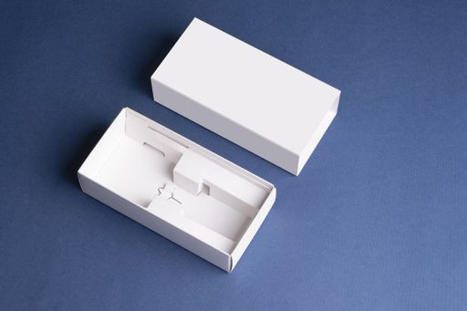 White smartphone's pull out boxes on blue surface