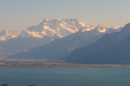 A mesmerizing scenery of the swiss alps over the Geneva lake in Montreux, Switzerland at dawn