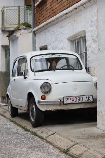 A classic white vintage car parked on the street of Prilep, Macedonia